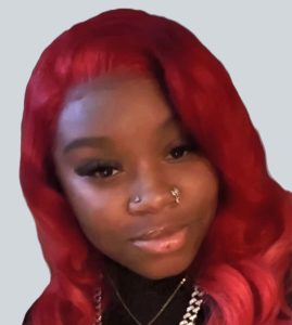 Ireaile "Ire" McKinley, Styist Manager for Nappy Hutt LLC Savannah and Atlanta (Stone Mountain), in a professional headshot.